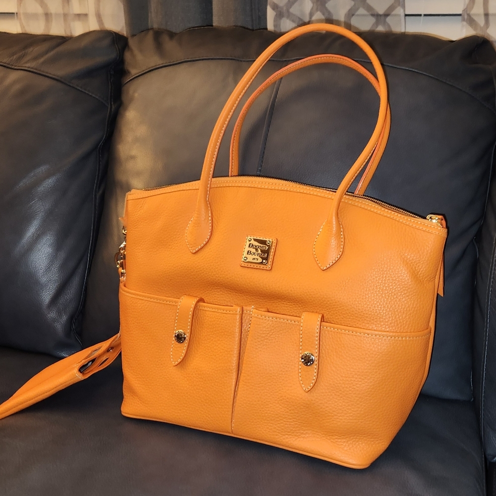 Dooney & Bourke Pumpkin orange Genuine Leather Crescent Tote, NWOT.  12 X 14"